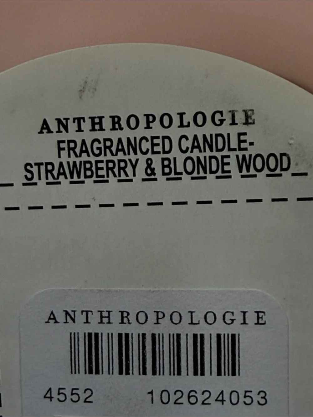 Pink Glass Lidded Strawberry 3 Wick Candle from Anthropologie.